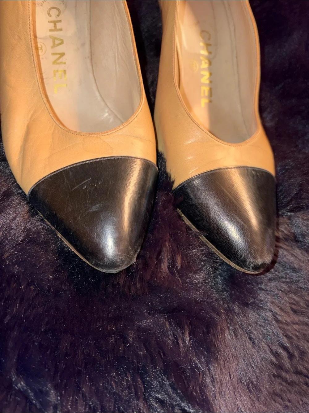 CHANEL Classic Beige & Black Cap Toe Pumps – Timeless Parisian Elegance